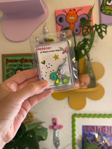 A Weird Little Object 8, green sword