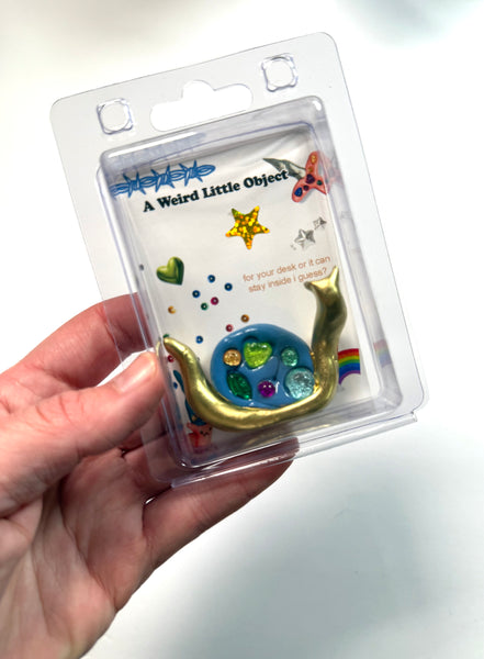 A Weird Little Object 7, gold snail