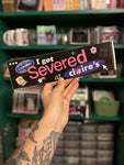 I Got Severed at Claire's! XL Bumper sticker. 11 x 3 inches in high gloss.