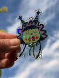 Sad Clown with Double Pointed Hat broken rainbow glass effect keychain, 3 inches