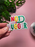 Not a Hugger 4 inch iron on patch, designed by latenightcrew AU.