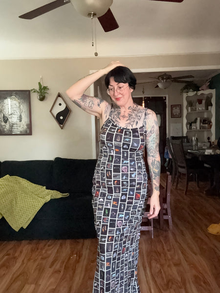 A fashion brand body con fish dress black xl (new with tags).