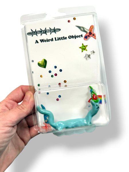 A Weird Little Object 12, long blue cat