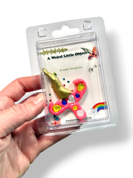 A Weird Little Object 11, gold pink sword