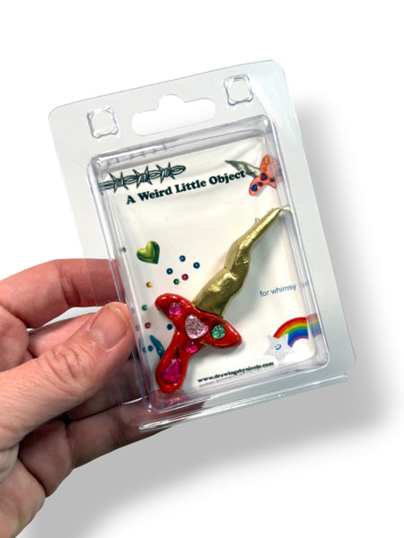 A Weird Little Object 4, red and gold sword