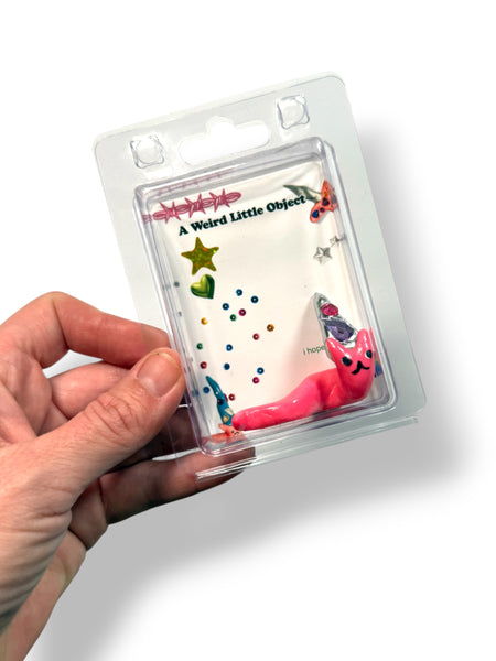 A Weird Little Object 2, a pink wizard cat