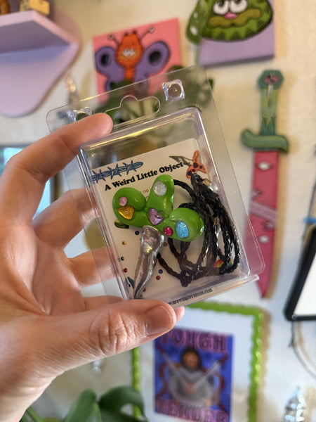 Sword Bolo Tie (green and silver), A Weird Little Object, clay and gloss