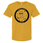 Circle Weird Mom Club Logo on a mustard or gold shirt.