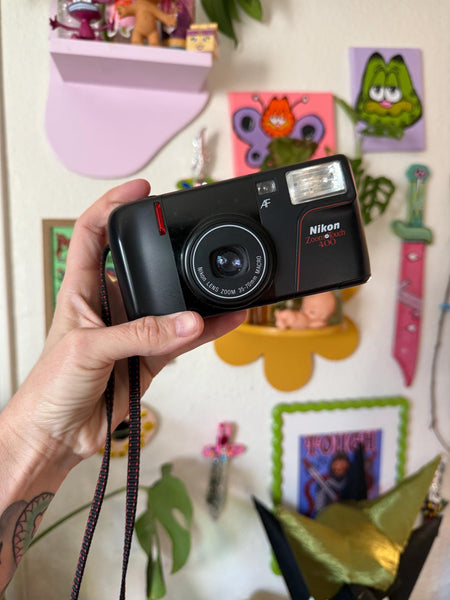 Vintage Nikon Zoom and Touch 400, 35-70mm macro point and shoot camera takes 35mm film, tested. Fair